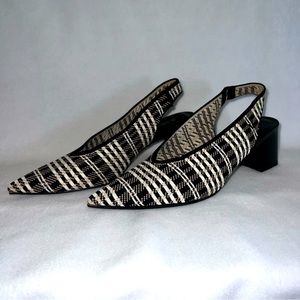 Viviana slip on mules with heel strap.